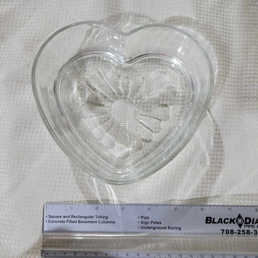 This adorable clear glass bowl could easily be used for serving candy, nuts,...